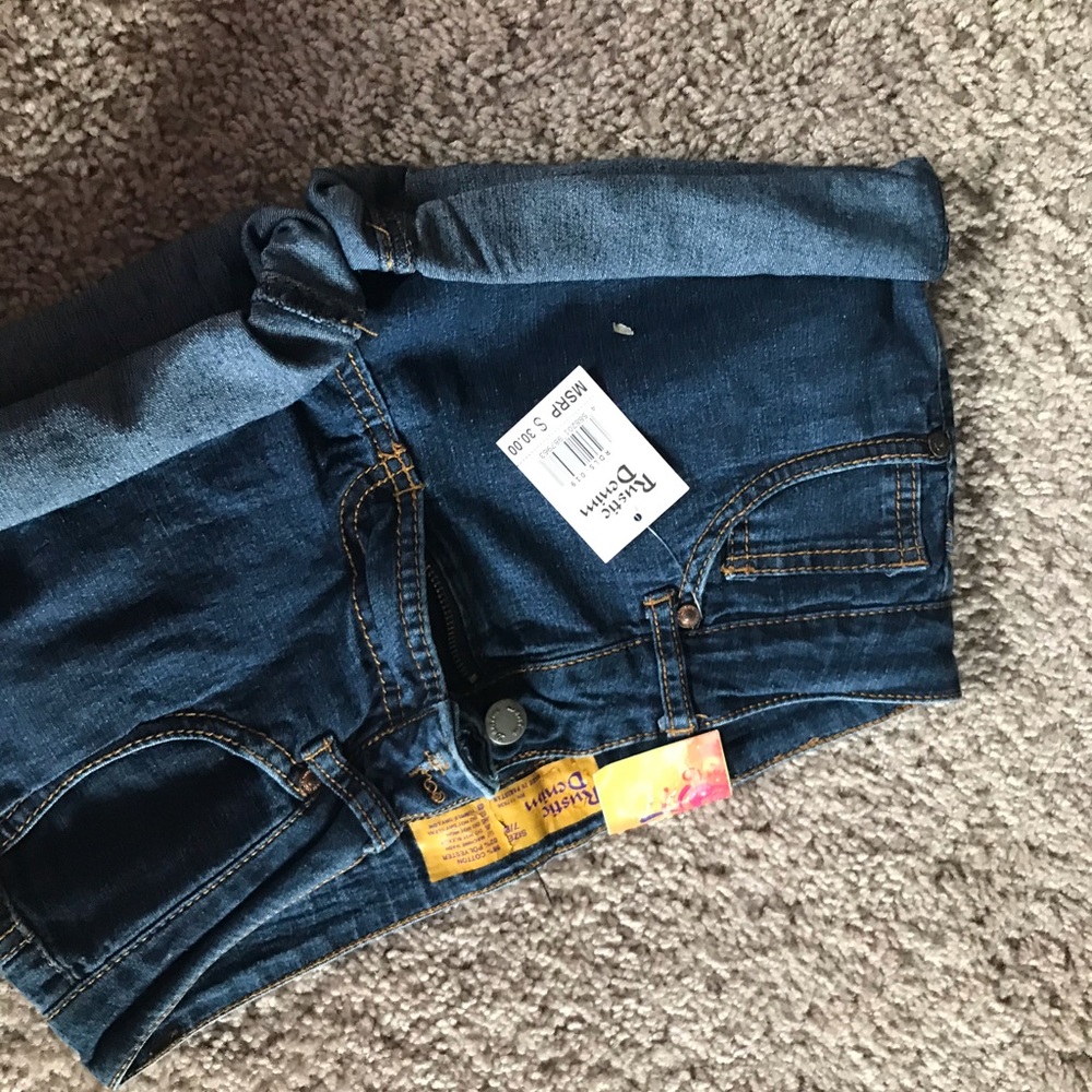 Selling dark denim shorts